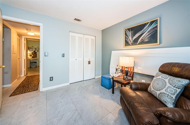 sitting room with light tile patterned floors