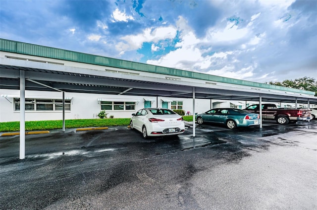 view of car parking featuring a carport