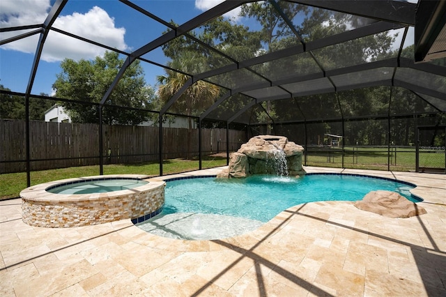 view of pool with glass enclosure, a patio area, an in ground hot tub, and pool water feature