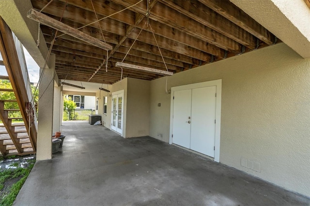 view of patio featuring french doors and stairs