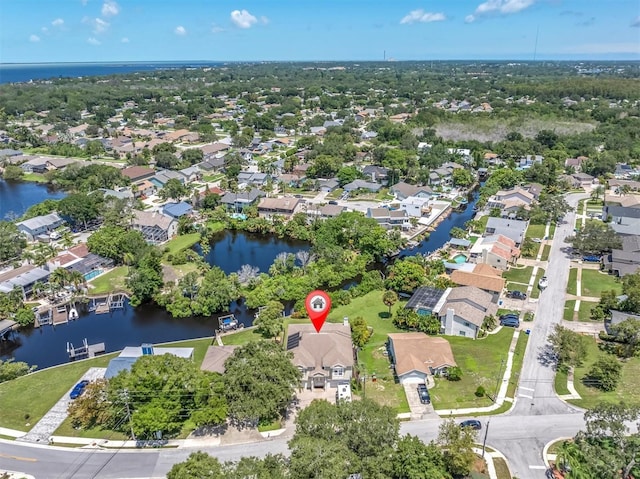 aerial view with a water view and a residential view