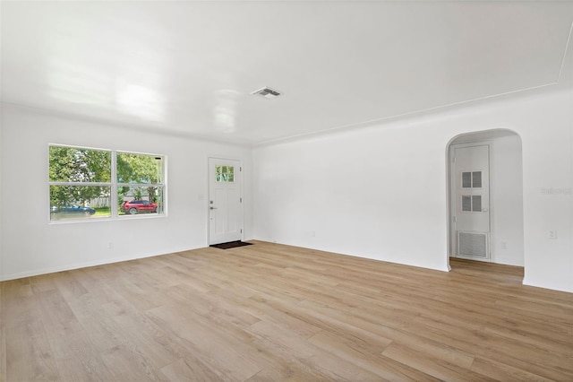 unfurnished room with light hardwood / wood-style flooring