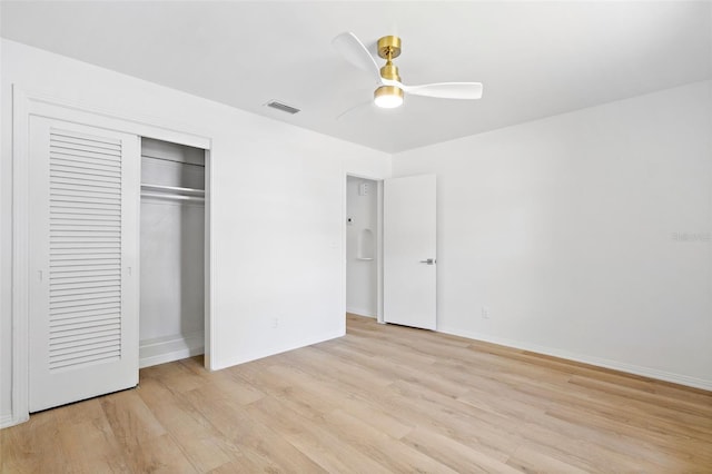 unfurnished bedroom featuring a closet, ceiling fan, and light hardwood / wood-style floors