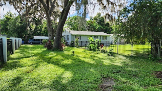 view of yard featuring fence