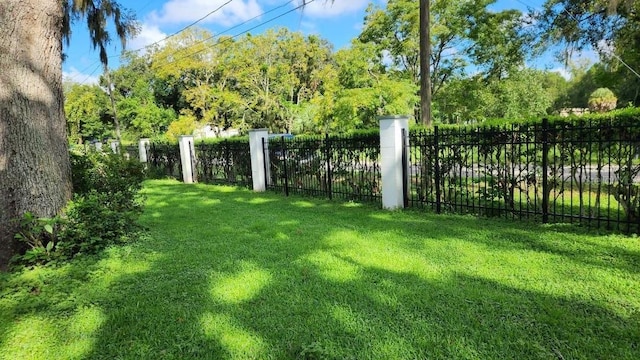 view of yard with fence