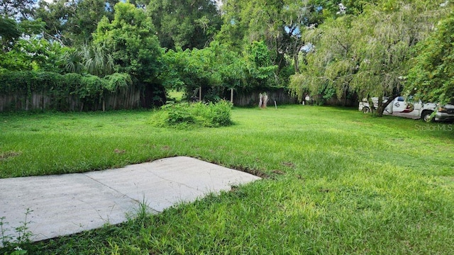 view of yard with fence