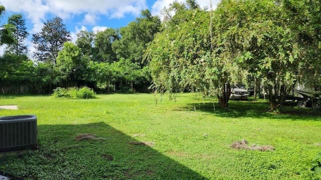 view of yard featuring central AC unit