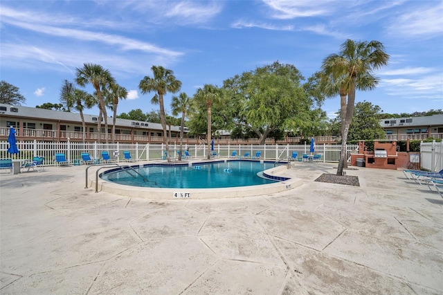 view of pool with a patio area