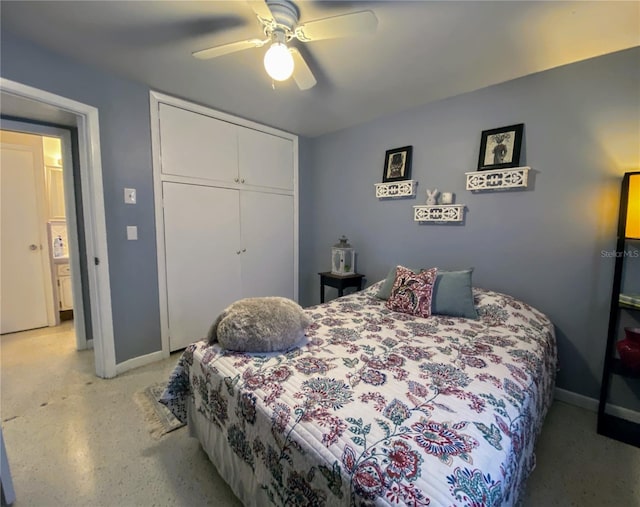 bedroom with ceiling fan and a closet