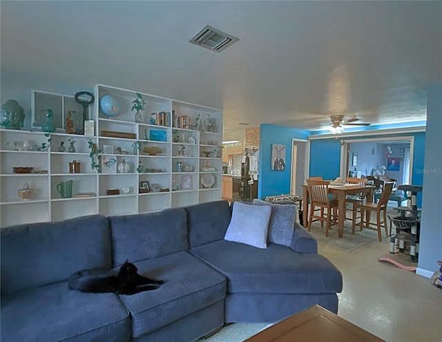 living room with ceiling fan