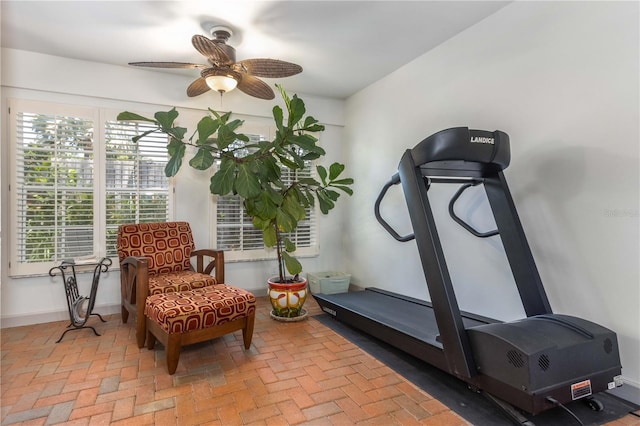 workout area with ceiling fan