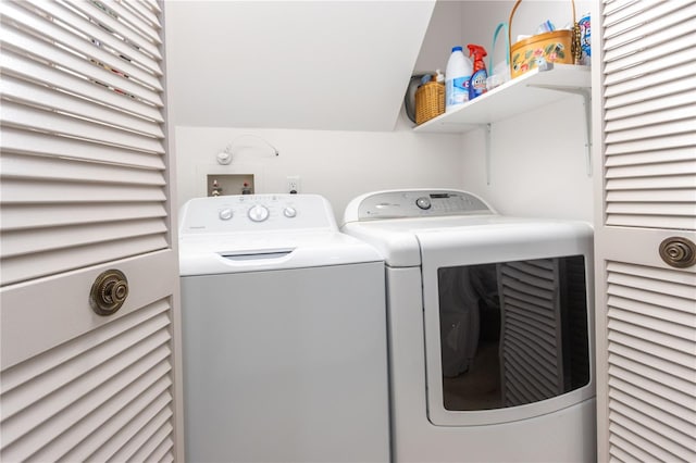 laundry area featuring washing machine and dryer