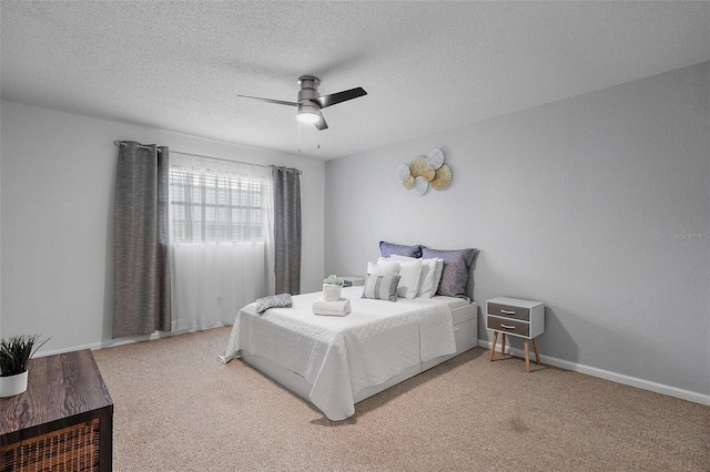 200 Country Club Dr Unit 1004, Largo, FL 33771 - bedroom featuring ceiling fan, light colored carpet, baseboards, and a textured ceiling