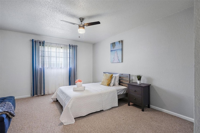 200 Country Club Dr Unit 1004, Largo, FL 33771 - carpeted bedroom featuring baseboards, a textured ceiling, ceiling fan, and a textured wall