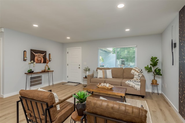 living room with light hardwood / wood-style floors