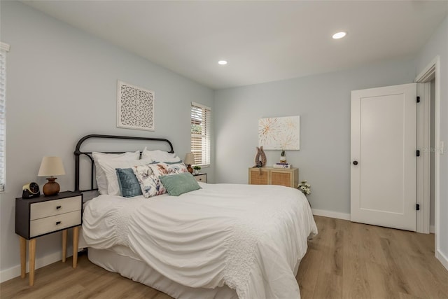 bedroom featuring light wood-type flooring