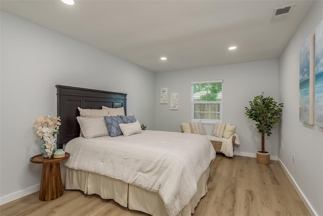 bedroom with light hardwood / wood-style flooring