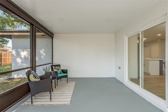 sunroom / solarium featuring a wealth of natural light