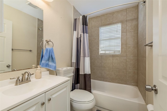 full bathroom with shower / bath combo, toilet, and vanity