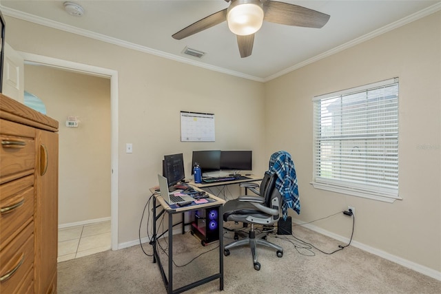 carpeted office featuring ceiling fan and crown molding