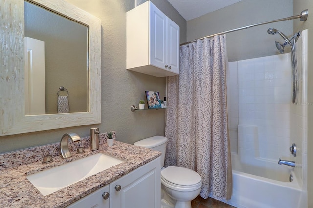 full bathroom with shower / bath combo with shower curtain, toilet, and vanity