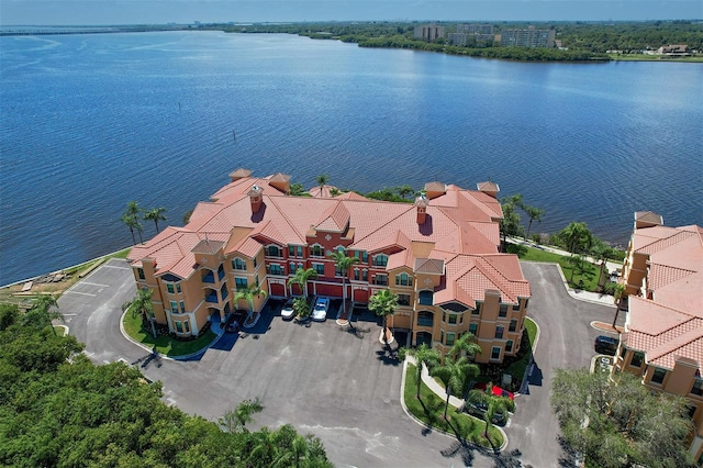 birds eye view of property featuring a water view