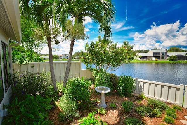 water view with a fenced backyard