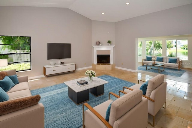 living room featuring lofted ceiling