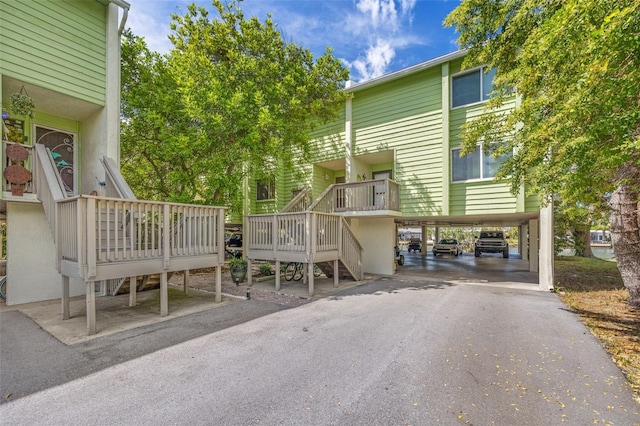 exterior space featuring a carport