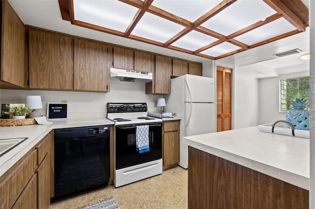 kitchen featuring black dishwasher, visible vents, freestanding refrigerator, under cabinet range hood, and range with electric stovetop