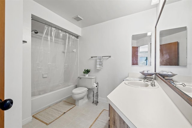 full bath with double vanity, visible vents, toilet, shower / tub combo with curtain, and a sink