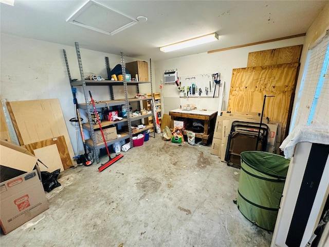 interior space with a wall mounted air conditioner