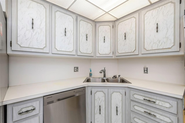 kitchen featuring dishwasher and sink