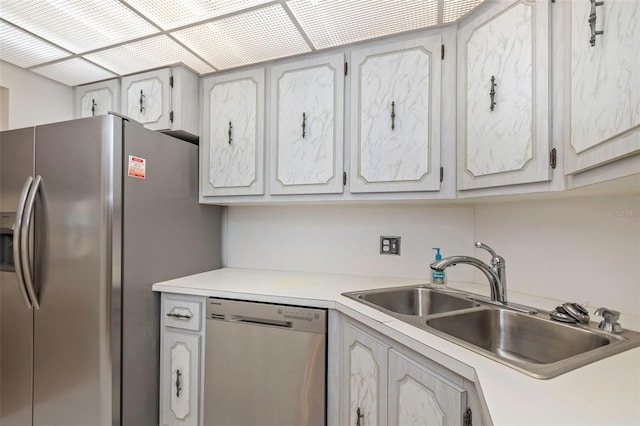 kitchen with appliances with stainless steel finishes and sink