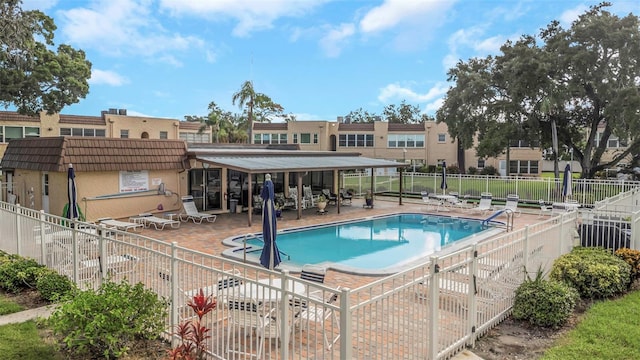 view of swimming pool with a patio area