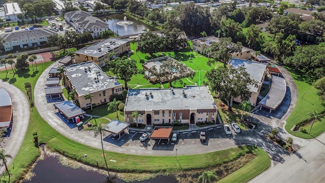 bird's eye view with a water view