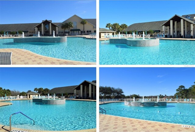 view of pool featuring pool water feature, a patio, and a hot tub