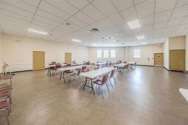 playroom featuring a paneled ceiling