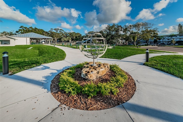 view of home's community with a yard and a gazebo