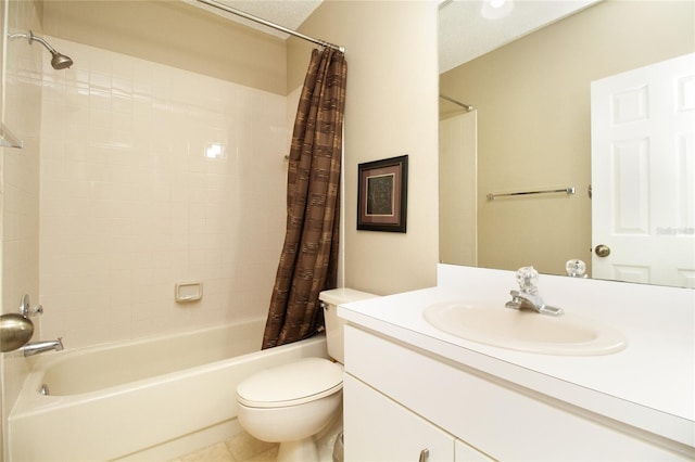 full bathroom featuring vanity, shower / bath combo, a textured ceiling, tile patterned floors, and toilet