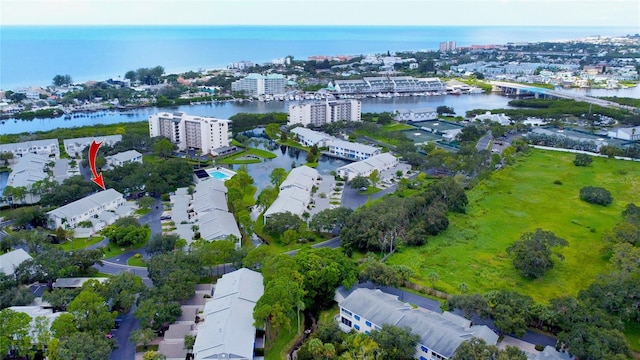 drone / aerial view with a water view