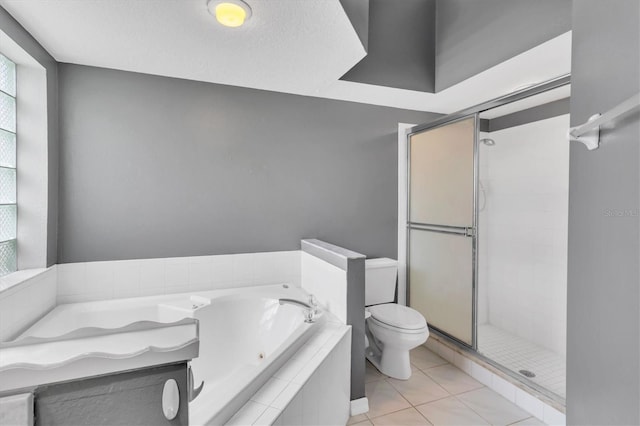 bathroom with toilet, a stall shower, a tub with jets, and tile patterned floors