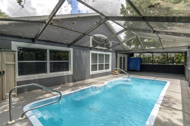 pool with a patio area