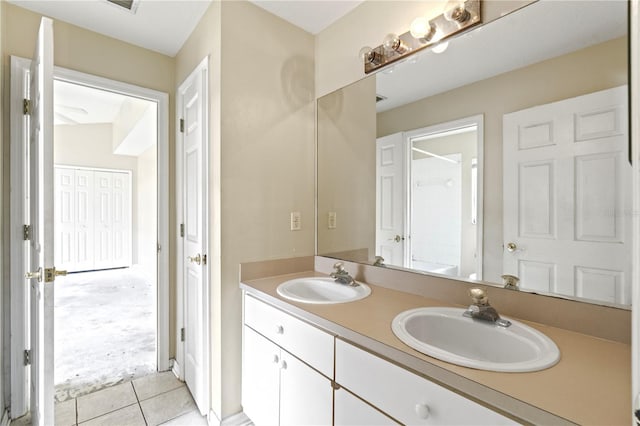 bathroom featuring tile patterned floors and vanity