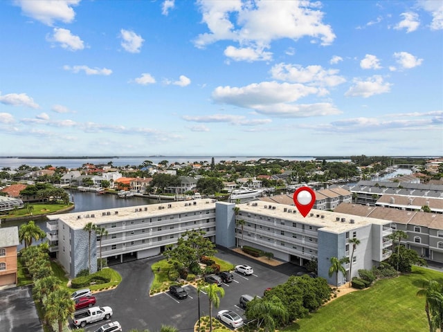 birds eye view of property featuring a water view