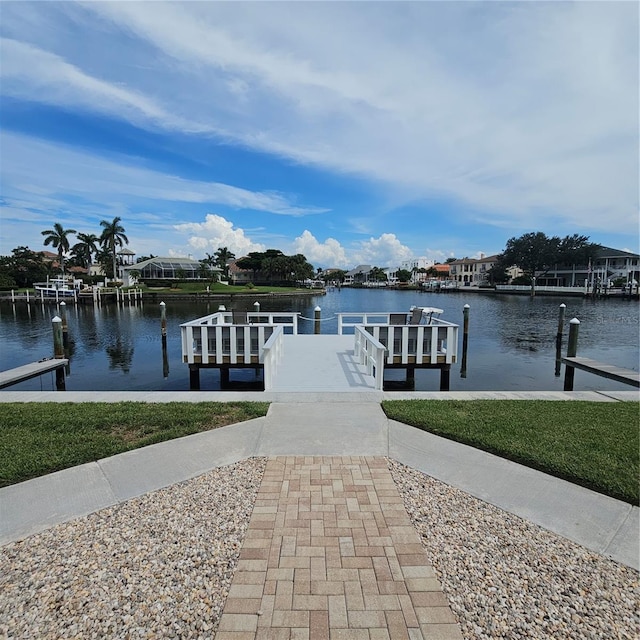 dock area with a water view