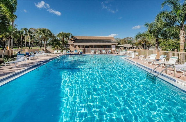 view of swimming pool with a patio