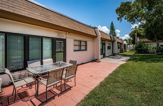 view of patio with outdoor dining area