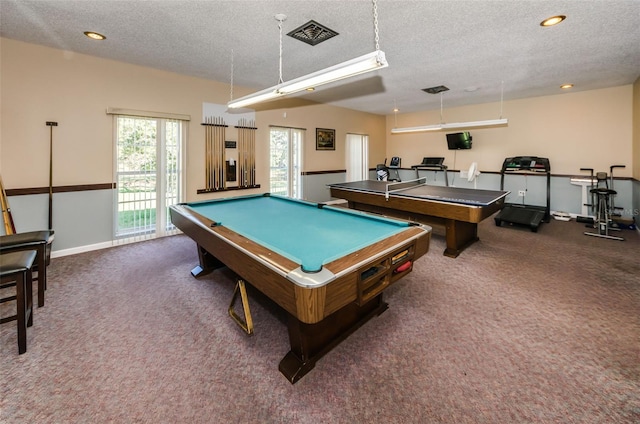 playroom featuring dark colored carpet, a textured ceiling, and billiards