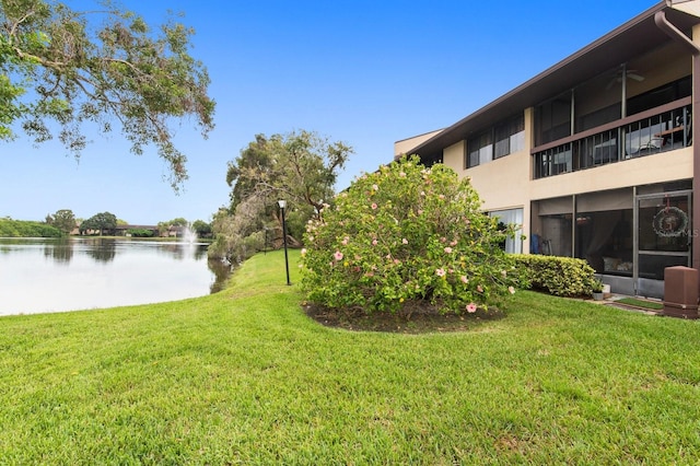 view of yard with a water view